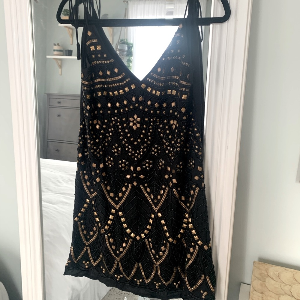 Black Mira dress with gold detail - size M